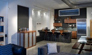 Loft kitchen showcasing custom kitchen cabinets