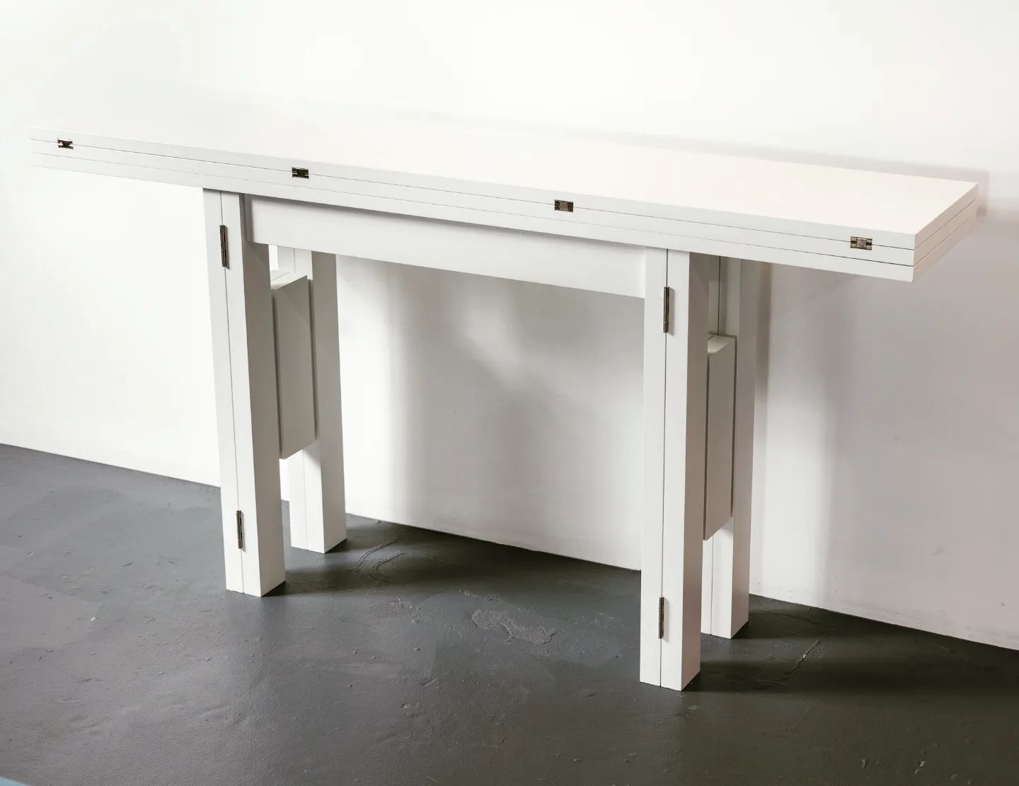 One of our Transformer tables - 60" in a white lacquer finish. Expands laterally from console to dining table, and great for city apartments. This piece is for sale at a 50% discount. "Floor model" 

#transformers #diningtable #consoletable #convertible #table #modernfurniture #modernhome #citylife #homedecor #interiors #interiordesignideas #designinspo #interiorinspo #designlife